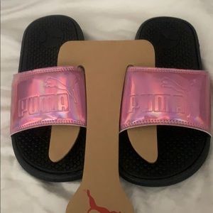 Kids size pink 2 puma slides